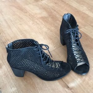 Women size 9,Vince Camuto black string up bootie.